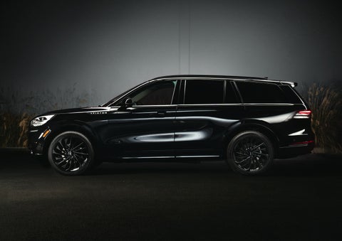 A 2024 Lincoln Aviator® SUV is shown in the Infinite Black exterior color | McLarty Daniel Lincoln in Bentonville AR
