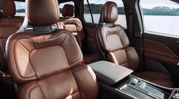 The front row's Perfect Position Seats in a 2024 Lincoln Aviator® Reserve model with Ebony Roast interior | McLarty Daniel Lincoln in Bentonville AR