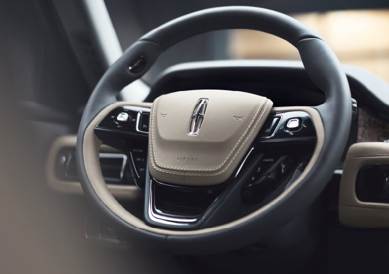 The intuitively placed controls of the steering wheel on a 2024 Lincoln Aviator® SUV | McLarty Daniel Lincoln in Bentonville AR