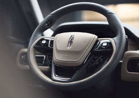 The intuitively placed controls of the steering wheel on a 2024 Lincoln Aviator® SUV | McLarty Daniel Lincoln in Bentonville AR