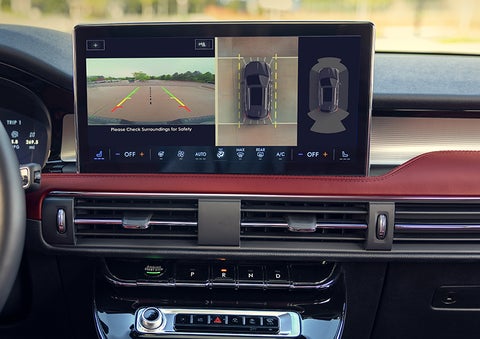 The driver of a 2024 Lincoln Corsair® SUV is shown selecting the drive mode. | McLarty Daniel Lincoln in Bentonville AR