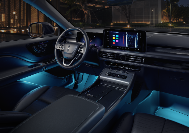 Deep blue ambient lighting glows from various places within a 2025 Lincoln Aviator® SUV. | McLarty Daniel Lincoln in Bentonville AR
