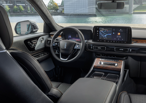 The interior of the 2025 Lincoln Aviator® SUV is shown parked with a view of a harbor through the windshield. | McLarty Daniel Lincoln in Bentonville AR
