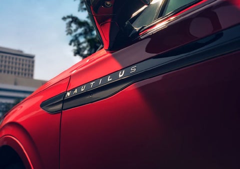 A side badge on the passenger door reads Nautilus. | McLarty Daniel Lincoln in Bentonville AR