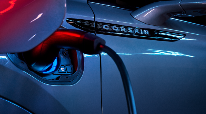 A charger plugged into the charging port of a 2025 Lincoln Corsair® Plug-in Hybrid model. | McLarty Daniel Lincoln in Bentonville AR