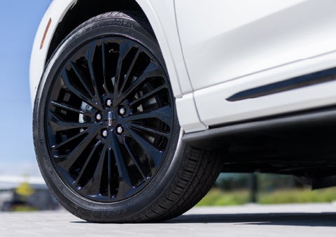 A stylish 20-inch black aluminum wheel of the available Jet Appearance Package is shown. | McLarty Daniel Lincoln in Bentonville AR