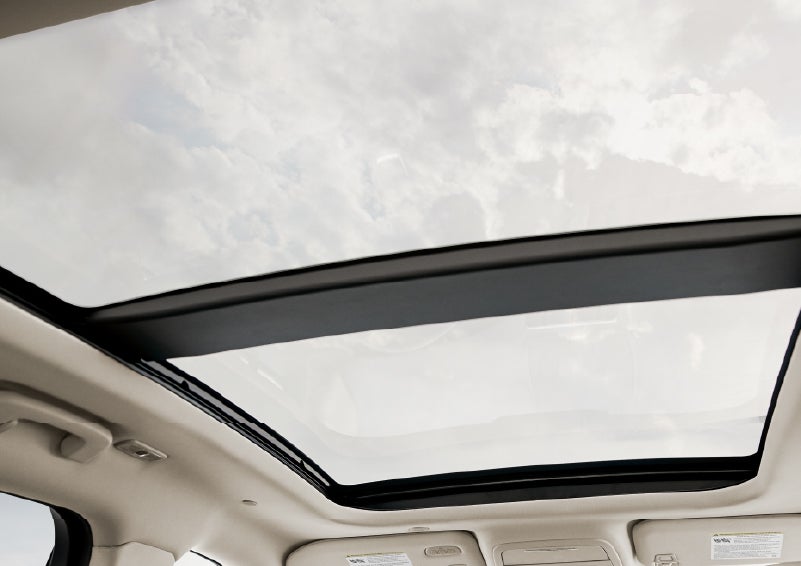 The available panoramic Vista Roof® is shown from inside a 2026 Lincoln Corsair® SUV | McLarty Daniel Lincoln in Bentonville AR