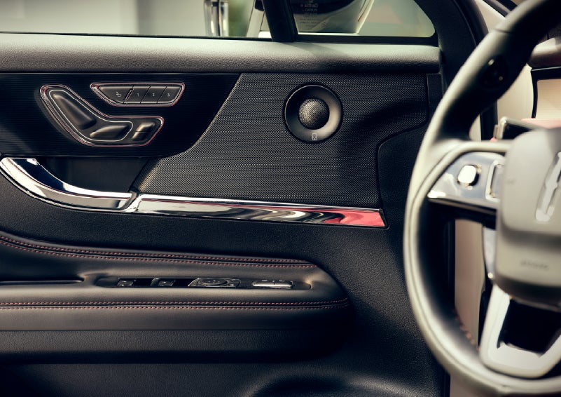An audio speaker is shown in the driver's side door of a 2026 Lincoln Corsair® SUV | McLarty Daniel Lincoln in Bentonville AR