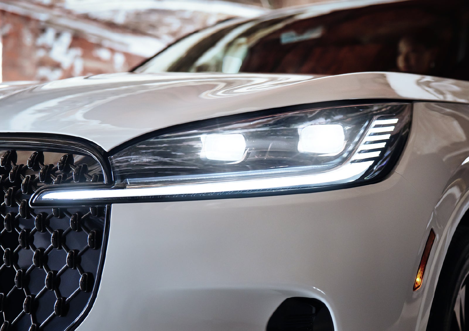 A close-up of a headlamp on the 2027 Lincoln Aviator® SUV is shown. | McLarty Daniel Lincoln in Bentonville AR