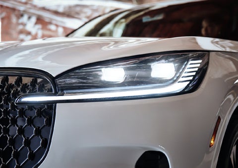 A close-up of a headlamp on the 2027 Lincoln Aviator® SUV is shown. | McLarty Daniel Lincoln in Bentonville AR