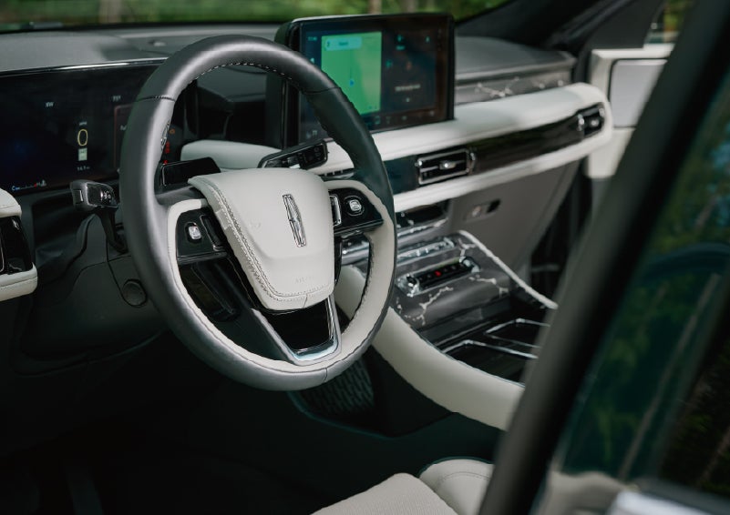 The leather-trimmed steering wheel of a 2027 Lincoln Aviator® Black Label™ SUV. | McLarty Daniel Lincoln in Bentonville AR